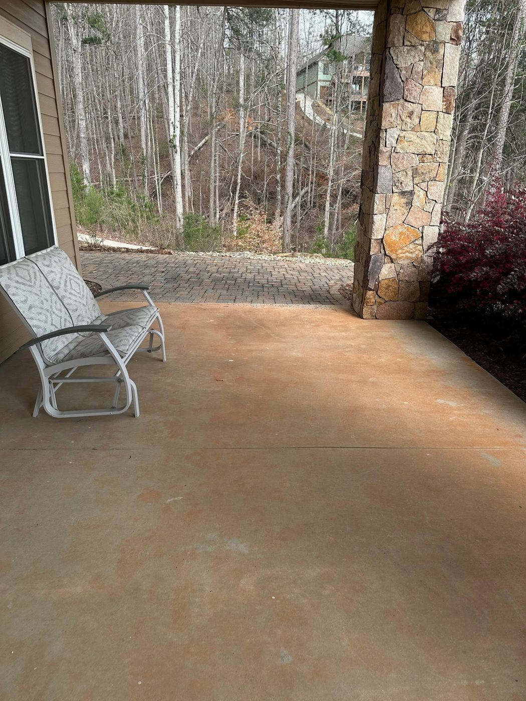 Rust-stained concrete before specialty stain removal